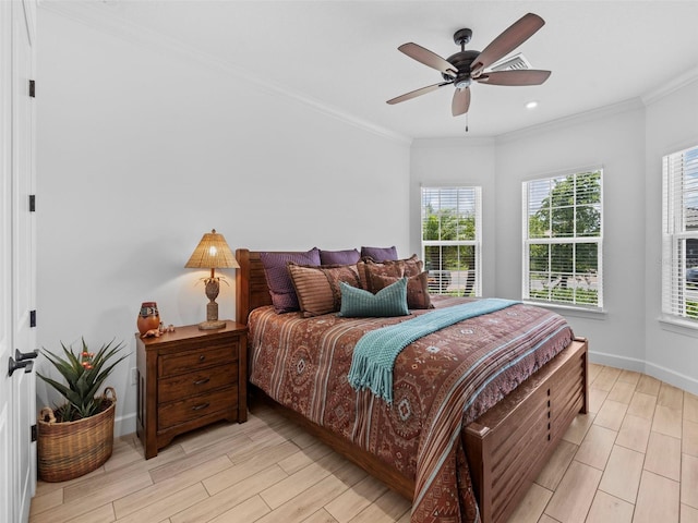 bedroom featuring light wood-style floors, baseboards, ornamental molding, and a ceiling fan