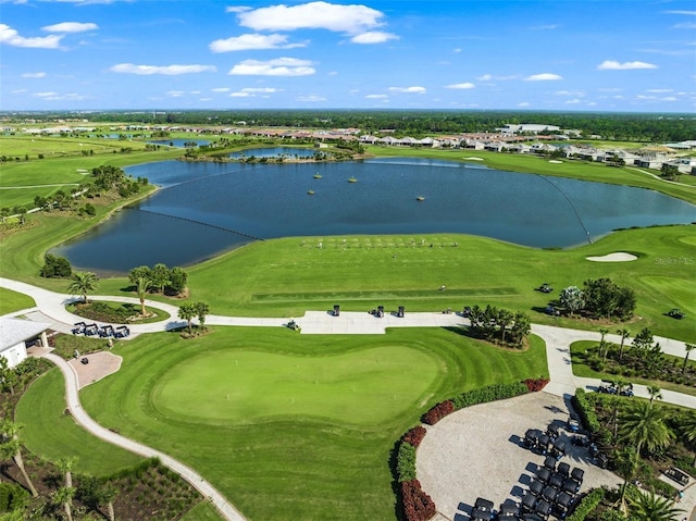 aerial view featuring a water view and golf course view