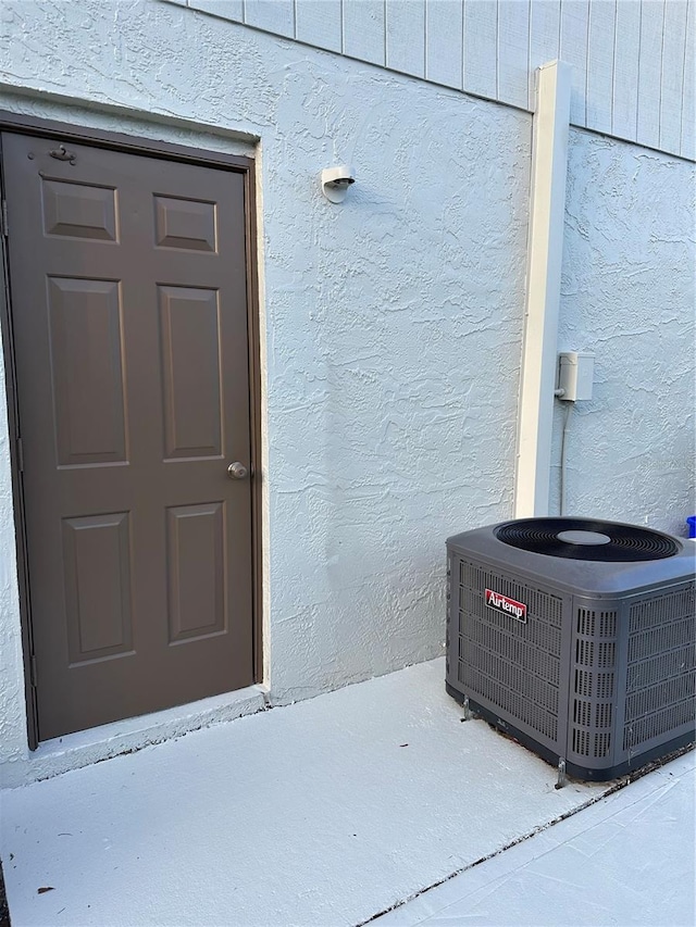 doorway to property with central air condition unit