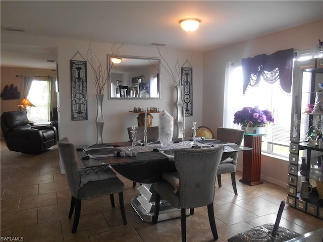 view of tiled dining room