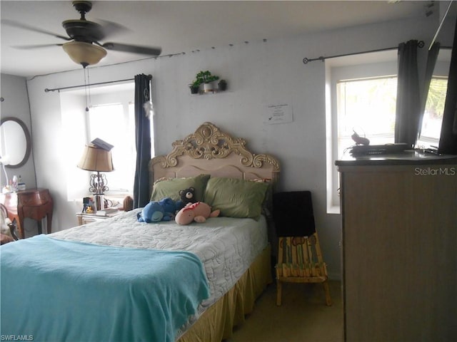 bedroom featuring ceiling fan