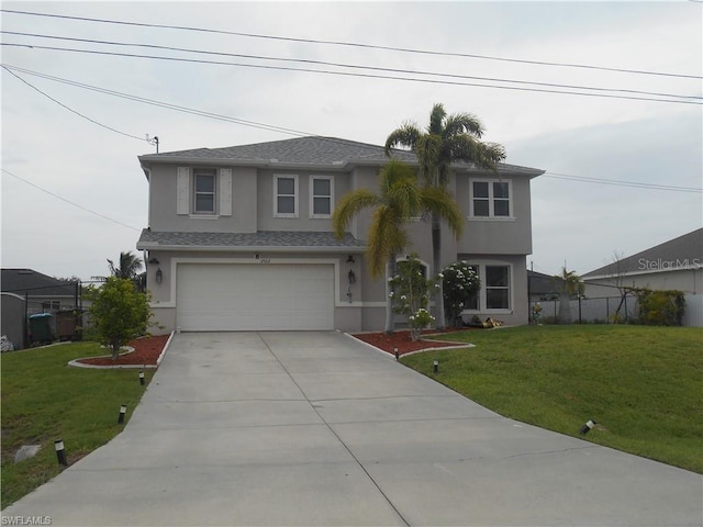 view of front facade with a front lawn and a garage