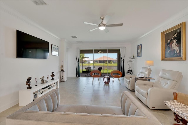 living room with ceiling fan and ornamental molding