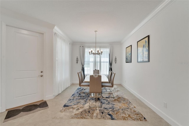 dining area featuring a textured ceiling, a notable chandelier, and ornamental molding