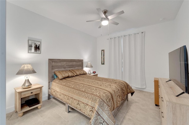 bedroom with light tile patterned floors and ceiling fan