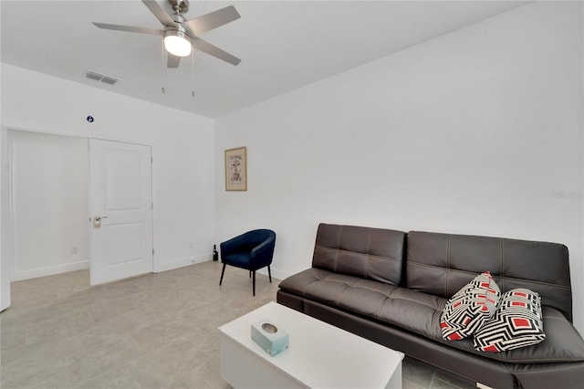 living room featuring ceiling fan