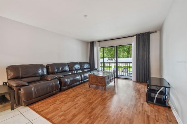 living room with light hardwood / wood-style flooring