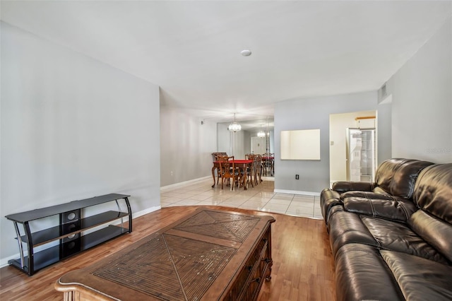 living room with light hardwood / wood-style flooring