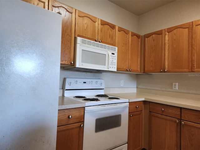 kitchen with white appliances