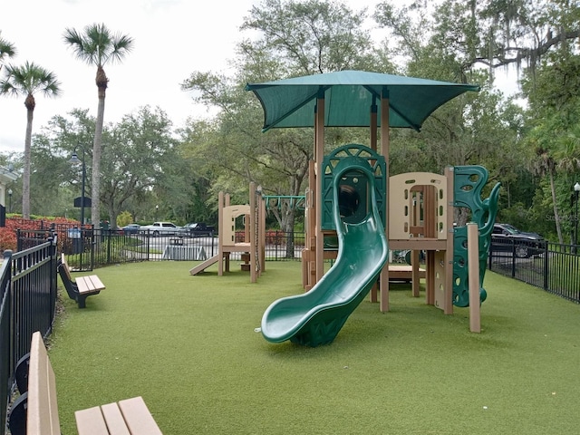 view of play area featuring a lawn