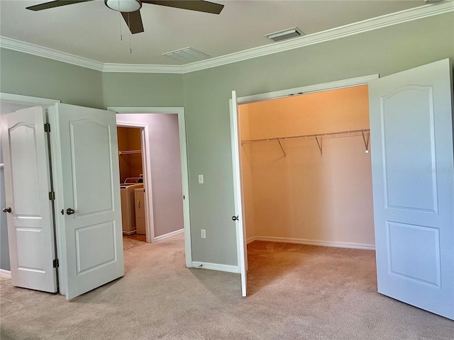 unfurnished bedroom featuring light colored carpet, ceiling fan, and ornamental molding