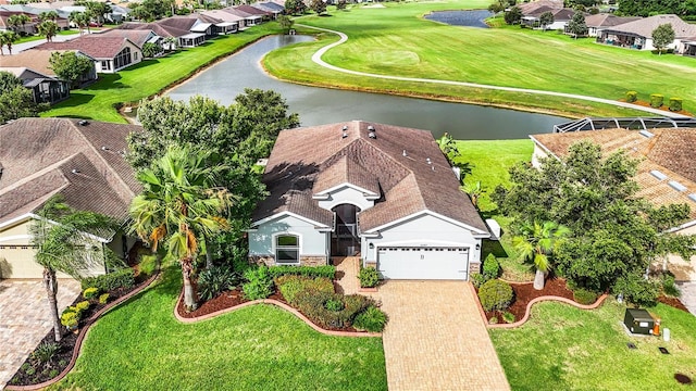 bird's eye view with a water view