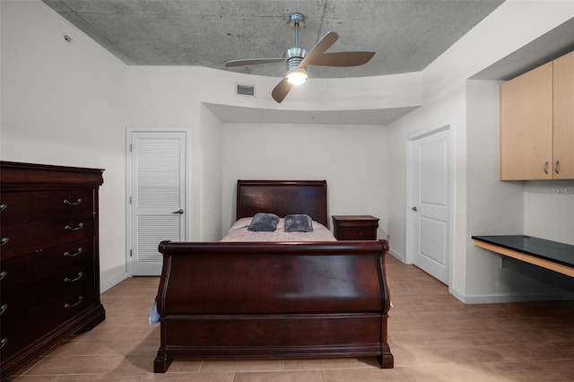 bedroom with ceiling fan and light hardwood / wood-style flooring