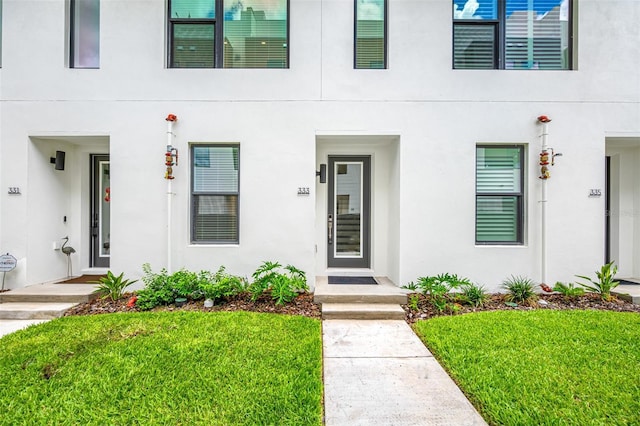 exterior space with a front lawn