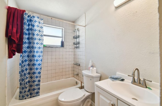 full bathroom featuring vanity, toilet, and shower / tub combo with curtain