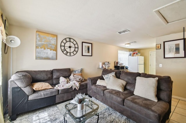 living room featuring light tile patterned floors