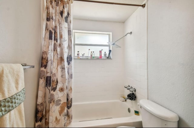 bathroom with shower / bath combo