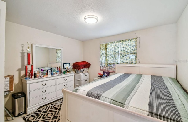 bedroom with a textured ceiling