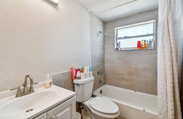 full bathroom with shower / bath combo, toilet, and vanity