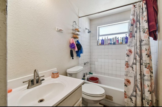 full bathroom featuring shower / tub combo with curtain, vanity, and toilet