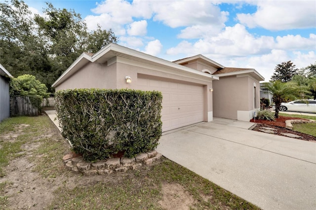 view of home's exterior with a garage