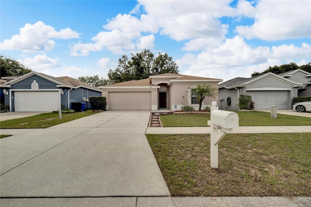 single story home featuring a front yard and a garage