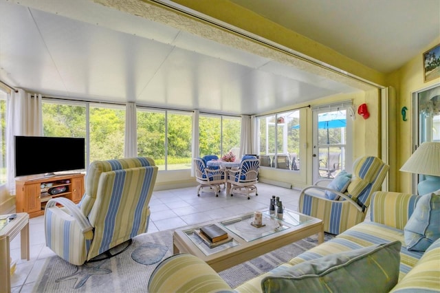 tiled living area featuring a wealth of natural light