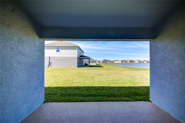 view of yard featuring a water view