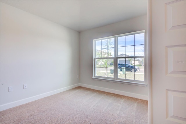 empty room featuring carpet flooring