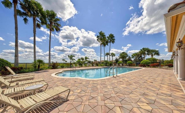 view of pool featuring a patio