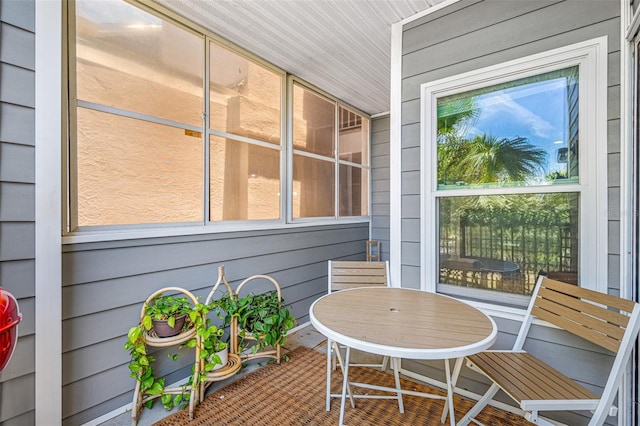 sunroom featuring a healthy amount of sunlight