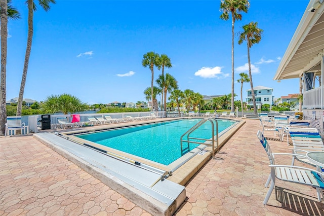 view of swimming pool featuring a patio