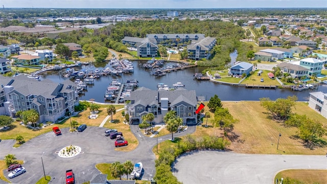 drone / aerial view featuring a water view