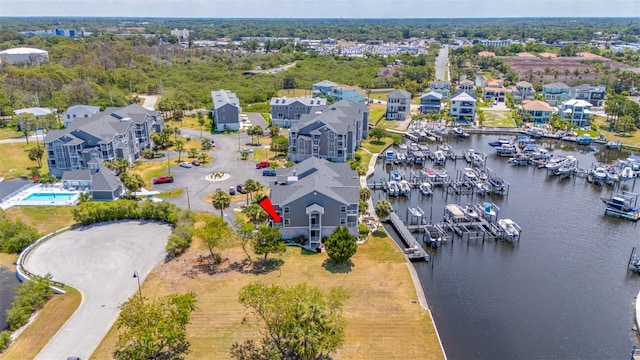 bird's eye view with a water view