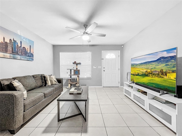 tiled living room with ceiling fan