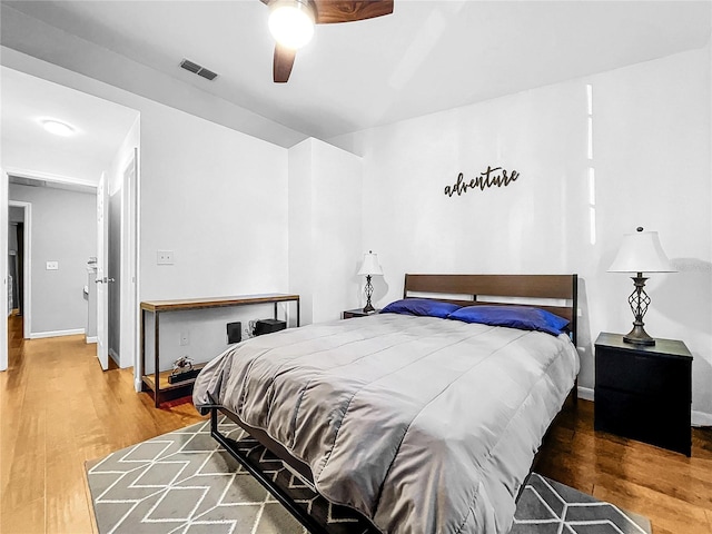 bedroom featuring wood-type flooring and ceiling fan