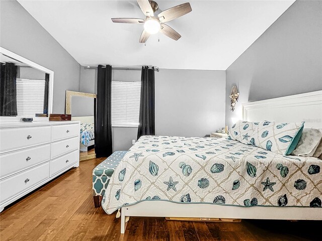 bedroom with wood-type flooring and ceiling fan