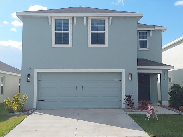 view of property with a garage