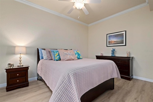 bedroom with ceiling fan, ornamental molding, and light hardwood / wood-style floors