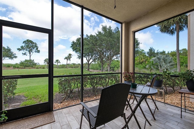 sunroom featuring a wealth of natural light