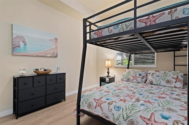 bedroom featuring light hardwood / wood-style floors