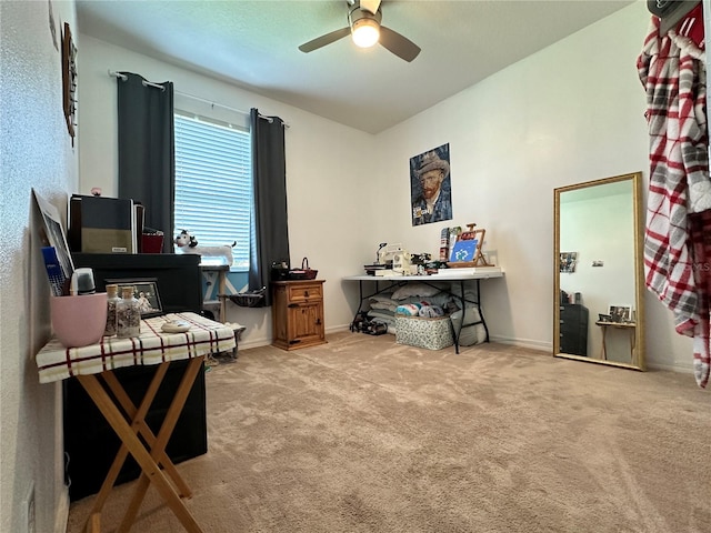 carpeted home office with ceiling fan