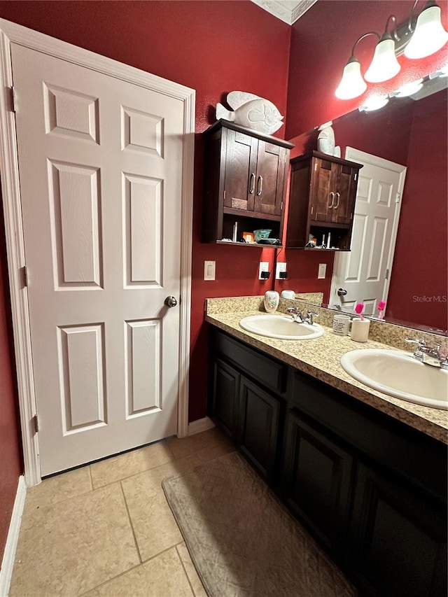 bathroom with tile patterned flooring and vanity