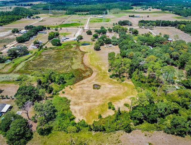 birds eye view of property featuring a rural view