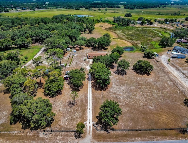 bird's eye view with a rural view and a water view