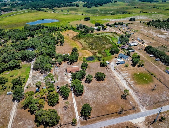 bird's eye view featuring a rural view and a water view