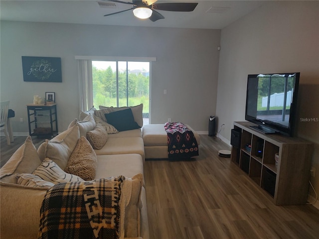 living room with ceiling fan and hardwood / wood-style floors