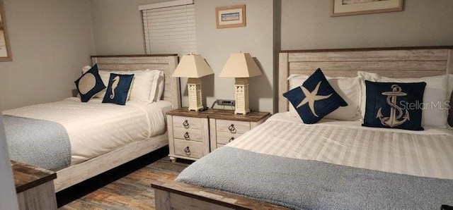 bedroom featuring dark hardwood / wood-style floors