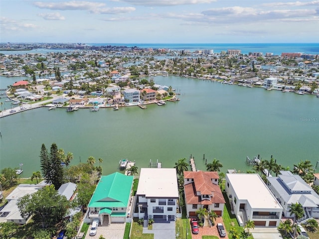 bird's eye view with a water view and a residential view