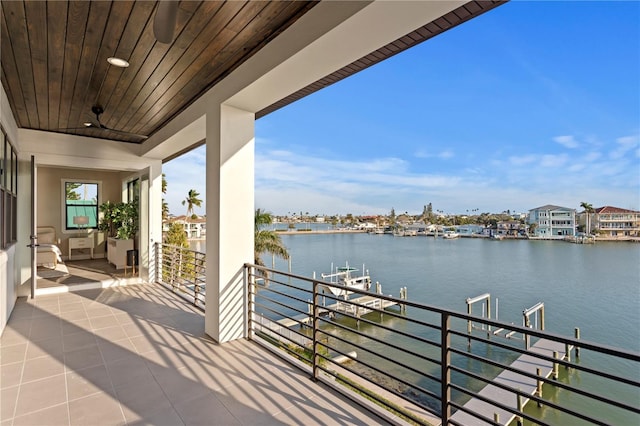 balcony featuring a water view